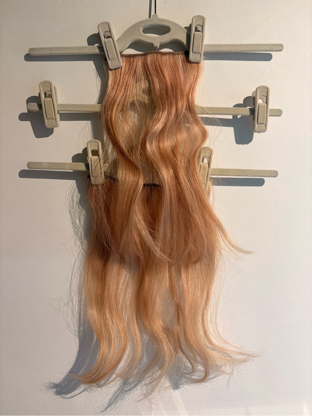 Blonde with pink tint clip in hair extensions
